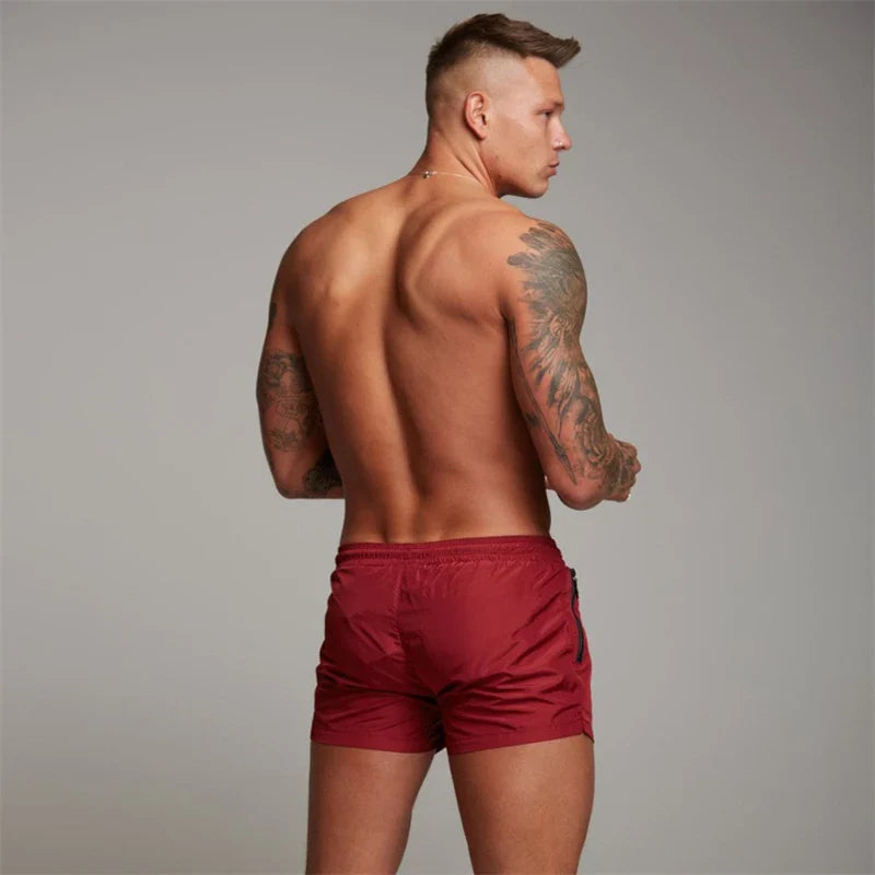 Simshorts med dragkedja